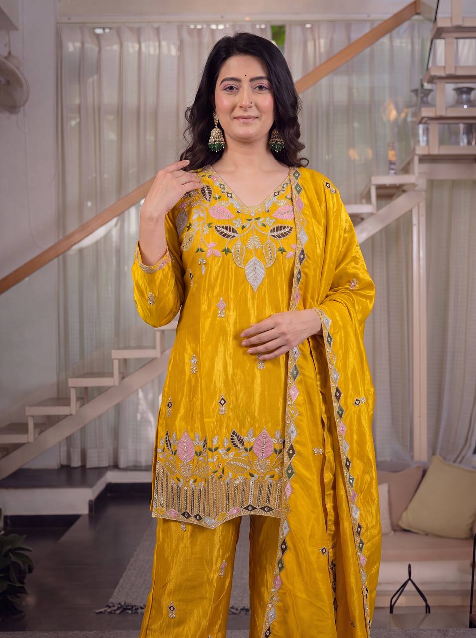 Elegant Rust Orange Silk Kurta and Flared Palazzo Set Adorned with Intricate Multicolored Botanical Embroidery and Mirror Work